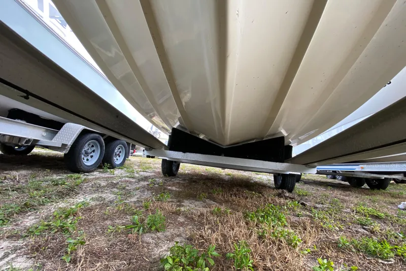 Slide: The Image of Underside view of a 2006 Mako 191 Inshore boat on a trailer. - 7