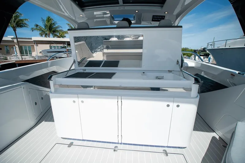 Slide: The Image of Azimut Verve 42 yacht interior, 2026 model, featuring sleek white cabinetry and modern design. - 19