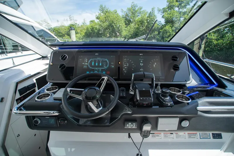 Slide: The Image of Cockpit of 2026 Azimut Verve 42 yacht with advanced navigation controls and digital displays. - 21