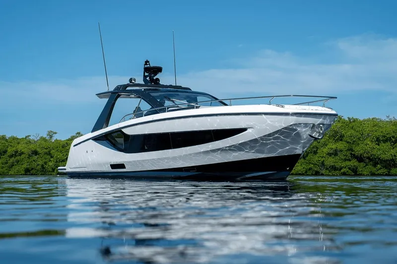 Slide: The Image of 2026 Azimut Verve 42 yacht on calm water, sleek design, clear blue sky. - 3