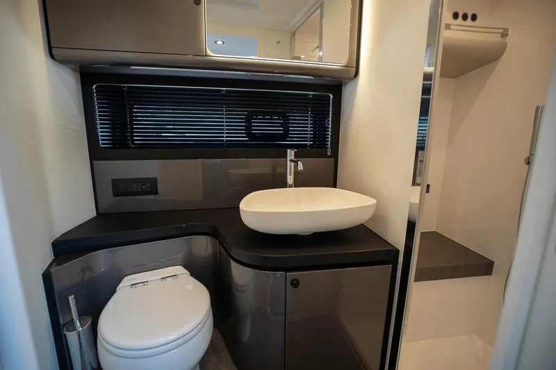 Slide: The Image of Luxurious bathroom interior of 2026 Azimut Verve 42 yacht, featuring modern sink and toilet. - 30