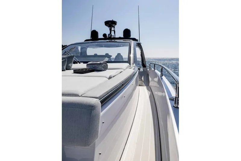 Slide: The Image of 2026 Azimut Verve 42 luxury yacht deck with sunbathing area, cruising on open water. - 37