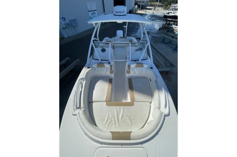 Slide: The Image of 2017 Edgewater 248CX Crossover boat with spacious seating and Garmin equipment. - 12