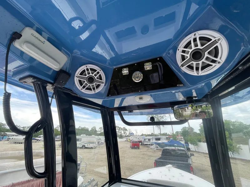 Slide: The Image of Interior view of 2022 Sportsman Masters 247OE Bay Boat with speakers and electronics. - 14