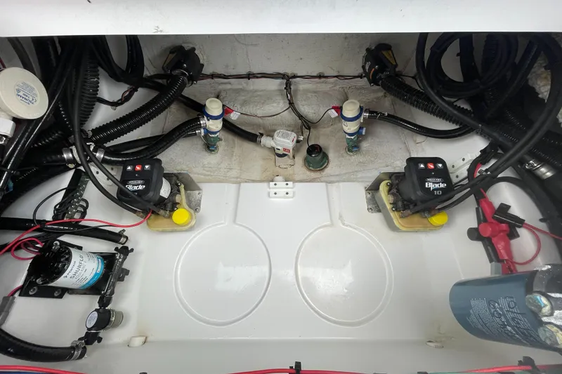 Slide: The Image of 2022 Sportsman Masters 247OE Bay Boat electrical and plumbing components. - 21