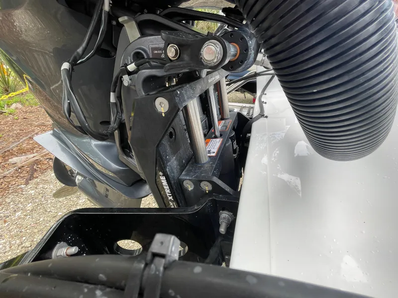 Slide: The Image of 2022 Sportsman Masters 247OE Bay Boat engine and mechanical components close-up. - 24