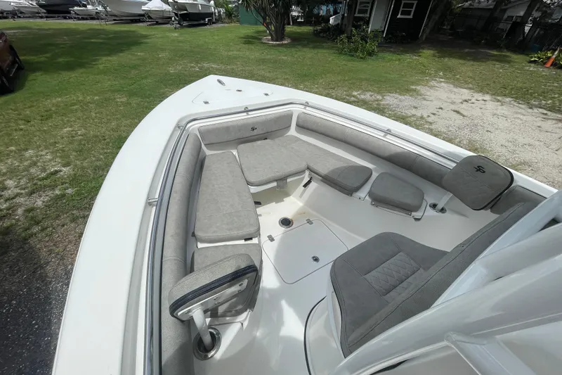 Slide: The Image of 2021 Sea Pro 219 Center Console boat with spacious seating and modern design. - 20