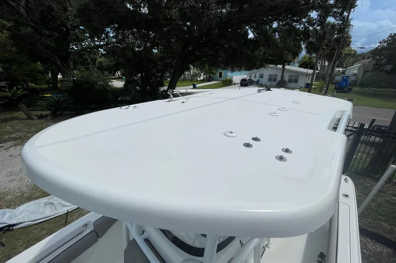 Slide: The Image of 2021 Sea Pro 219 Center Console boat top view, showcasing sleek design and fittings. - 6