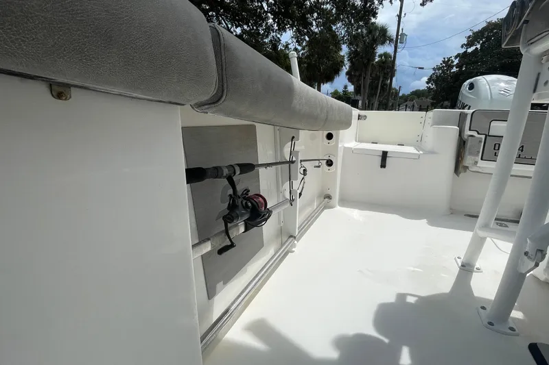 Slide: The Image of 2021 Sea Pro 219 Center Console boat interior with fishing rod holder. - 8
