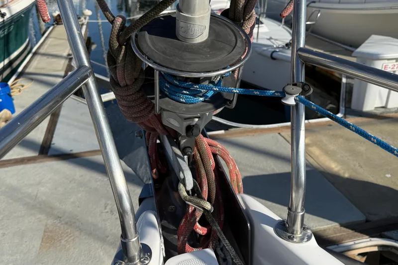 Slide: The Image of Close-up of rigging on a 1999 Hunter Passage 420 sailboat at a marina. - 10