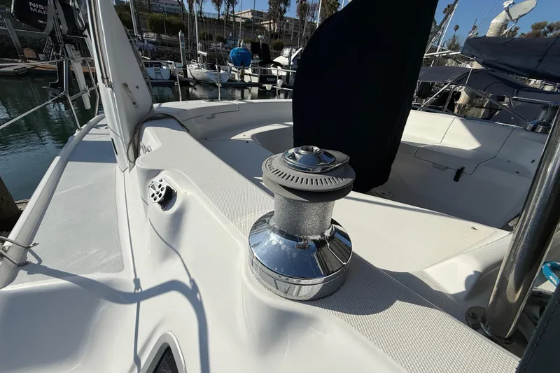 Slide: The Image of Deck view of 1999 Hunter Passage 420 sailboat in marina. - 16