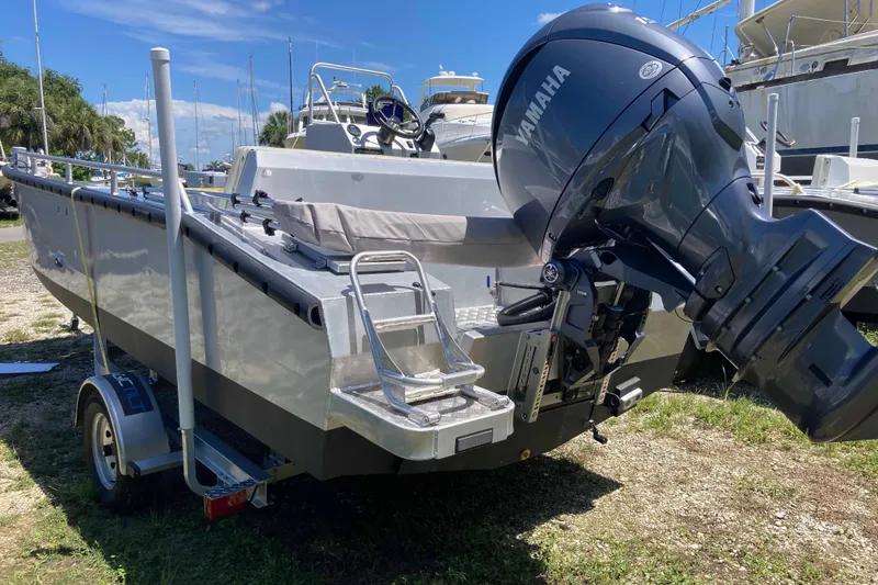 Slide: The Image of 2026 Gospel Boat Landing Craft with Yamaha outboard motor on trailer. - 2
