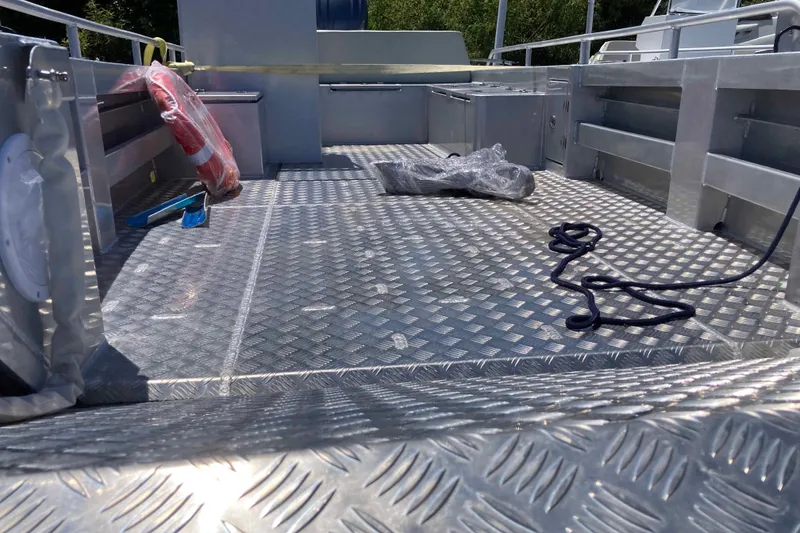 Slide: The Image of 2026 Gospel Boat Landing Craft with diamond plate flooring and safety equipment. - 5