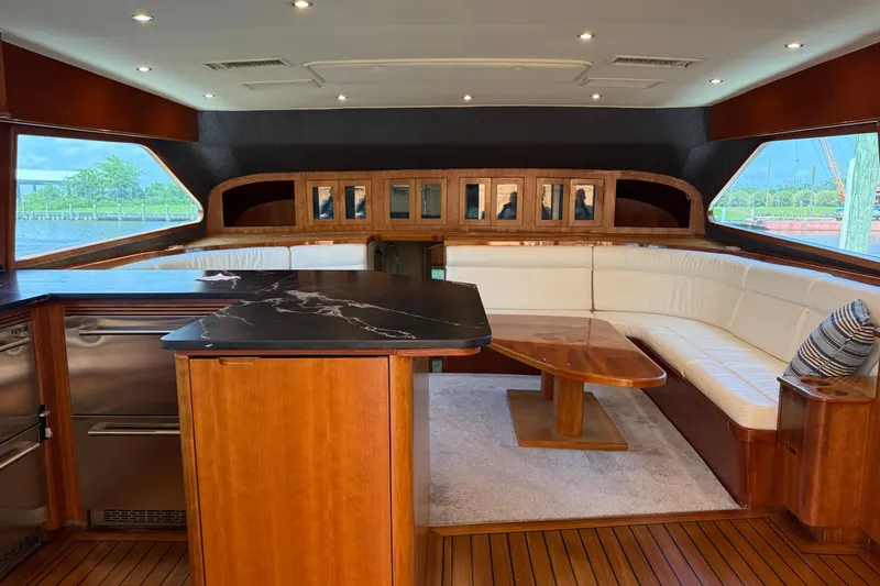 Slide: The Image of Luxurious interior of 1988 Cheoy Lee 58 Convertible yacht with elegant wood and leather seating. - 21