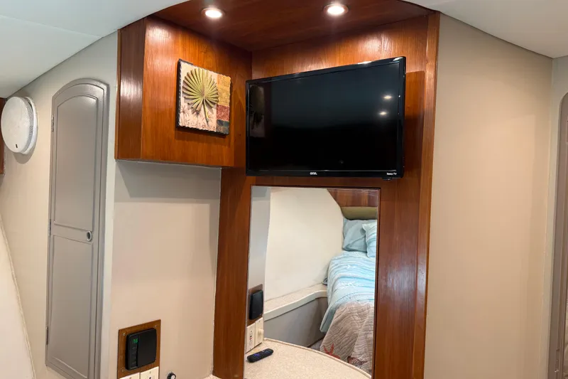 Slide: The Image of Interior of 1988 Cheoy Lee 58 Convertible yacht with TV and cozy bedroom. - 42