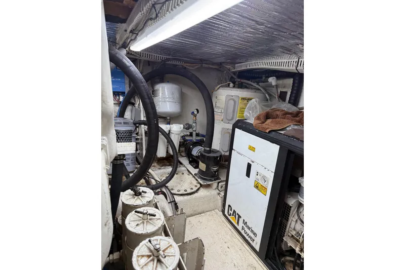 Slide: The Image of Engine room of 1988 Cheoy Lee 58 Convertible yacht with CAT Marine Power equipment. - 51