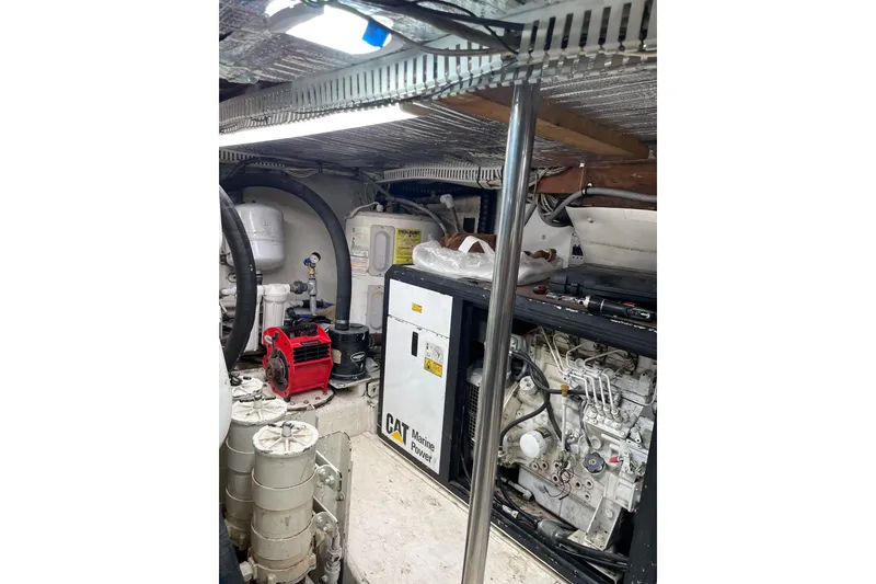Slide: The Image of Engine room of 1988 Cheoy Lee 58 Convertible yacht with CAT Marine Power equipment. - 9