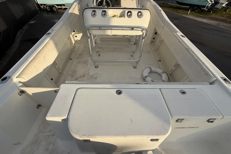 Slide: The Image of 2003 Hydra-Sports Vector 2600 CC boat on display under a clear blue sky. - 11