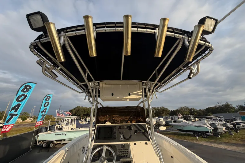 Slide: The Image of 2003 Hydra-Sports Vector 2600 CC boat interior with steering console and seating. - 16