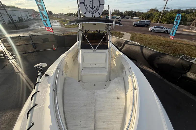 Slide: The Image of 2003 Hydra-Sports Vector 2600 CC boat console with steering wheel and controls. - 21