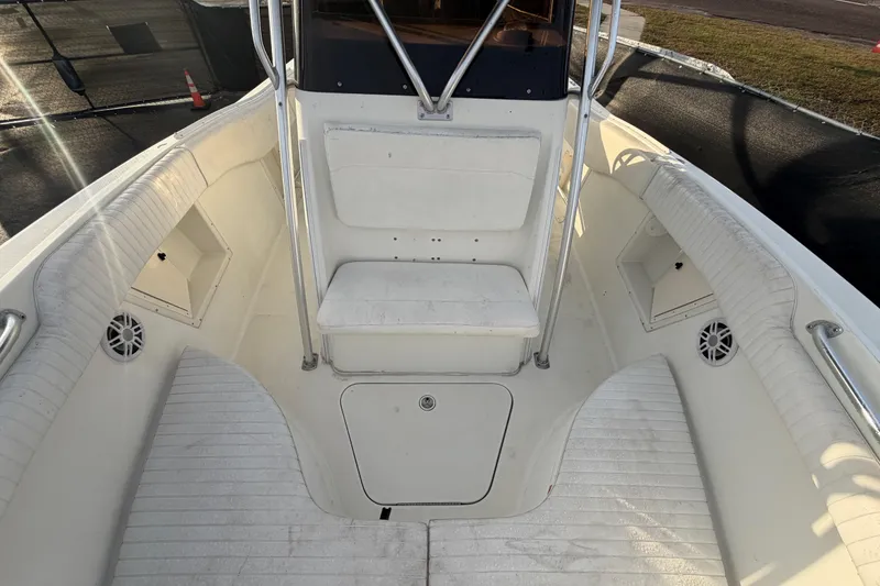 Slide: The Image of 2003 Hydra-Sports Vector 2600 CC boat console with steering wheel and controls. - 22