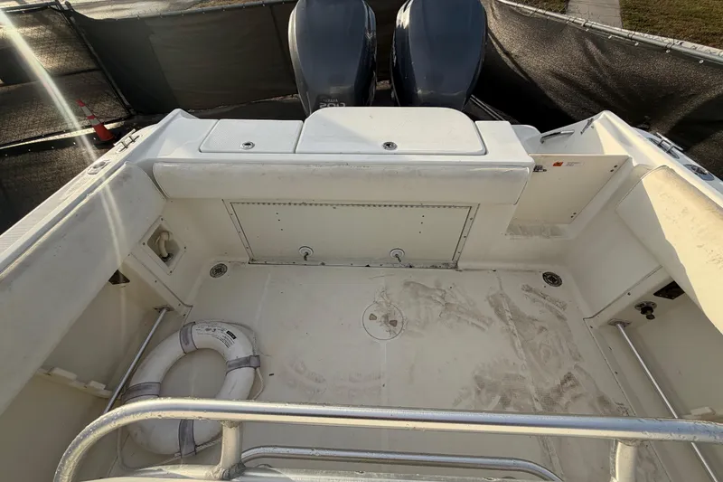 Slide: The Image of Control panel of a 2003 Hydra-Sports Vector 2600 CC boat with various switches. - 25