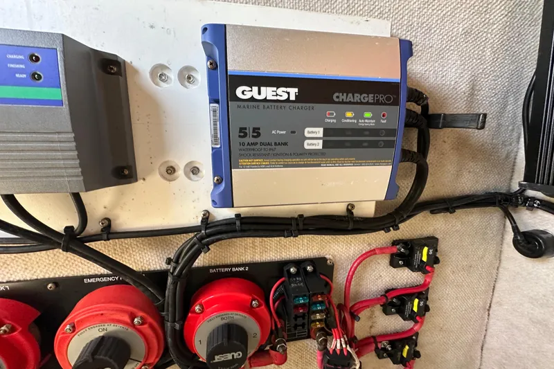 Slide: The Image of 2003 Hydra-Sports Vector 2600 CC boat detail, featuring a mounted socket on the interior panel. - 42