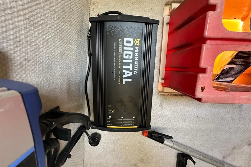 Slide: The Image of 2003 Hydra-Sports Vector 2600 CC boat interior with storage compartments and seating. - 43