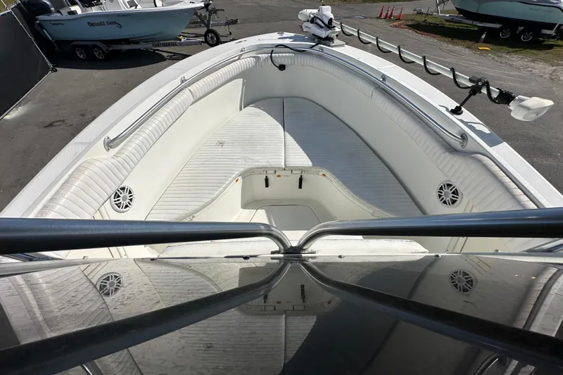 Slide: The Image of 2003 Hydra-Sports Vector 2600 CC boat interior with white seating and storage compartment. - 46