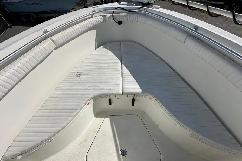 Slide: The Image of 2003 Hydra-Sports Vector 2600 CC storage compartment with pump and wiring visible. - 50