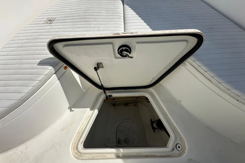 Slide: The Image of Open storage compartment in 2003 Hydra-Sports Vector 2600 CC boat interior. - 51