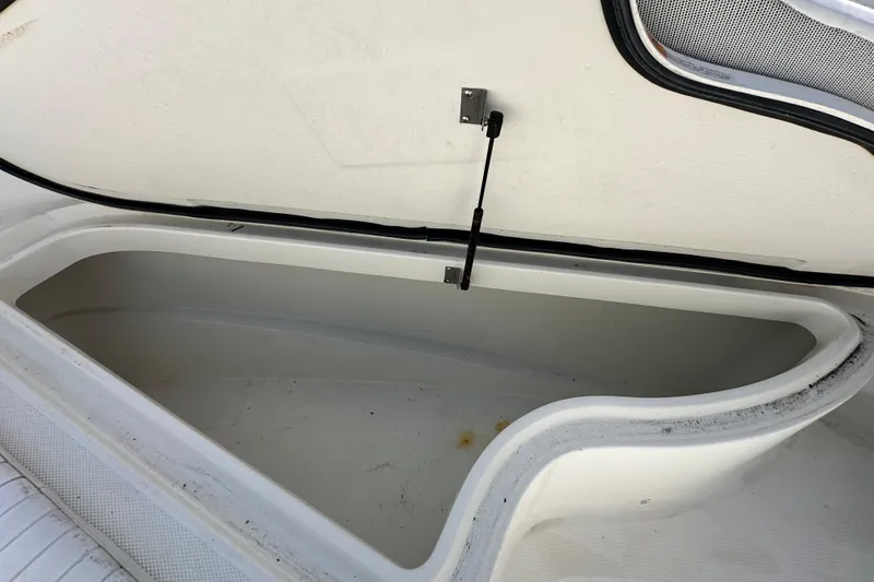 Slide: The Image of Open storage compartment on a 2003 Hydra-Sports Vector 2600 CC boat. - 54