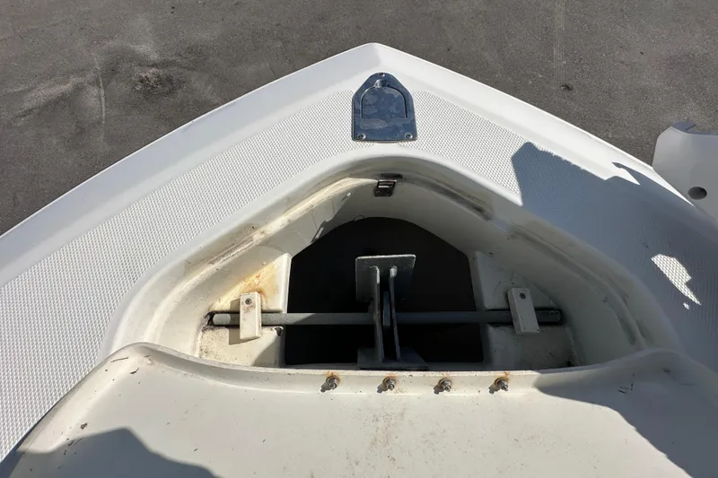 Slide: The Image of 2003 Hydra-Sports Vector 2600 CC with Garmin equipment on deck, parked in a marina. - 58