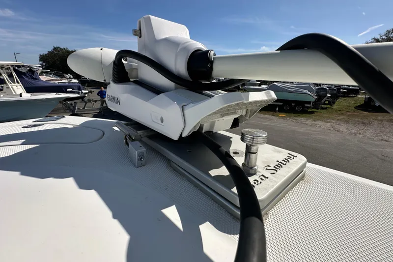 Slide: The Image of 2003 Hydra-Sports Vector 2600 CC boat, top view, docked on pavement. - 60