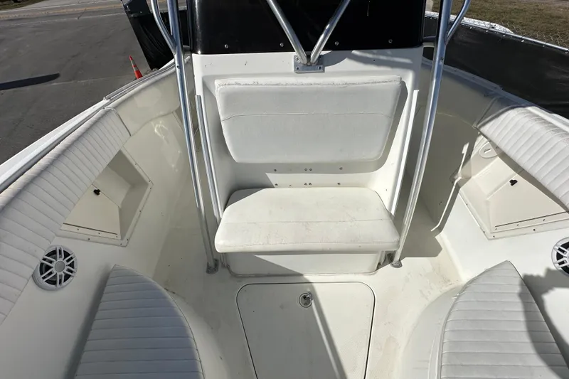 Slide: The Image of 2003 Hydra-Sports Vector 2600 CC boat storage compartment with rust stains. - 67