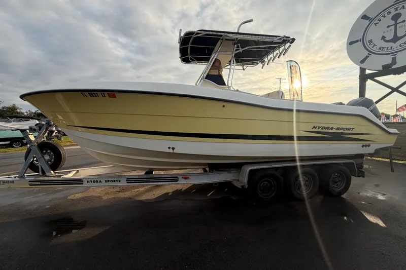 Slide: The Image of 2003 Hydra-Sports Vector 2600 CC boat on trailer, side view under clear sky. - 7