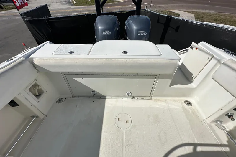 Slide: The Image of 2003 Hydra-Sports Vector 2600 CC with twin Yamaha 200 engines, docked on pavement. - 75