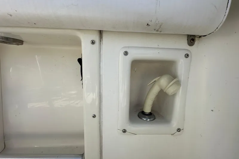 Slide: The Image of 2003 Hydra-Sports Vector 2600 CC boat storage compartment with open hatch. - 76