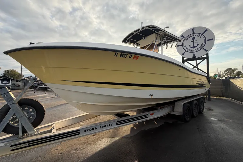 Slide: The Image of 2003 Hydra-Sports Vector 2600 CC boat on trailer under clear blue sky. - 8
