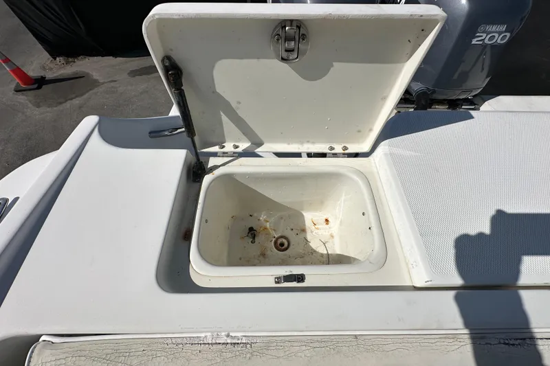 Slide: The Image of Open storage compartment on 2003 Hydra-Sports Vector 2600 CC boat. - 80