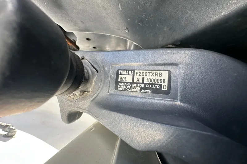 Slide: The Image of 2003 Hydra-Sports Vector 2600 CC hull identification number and metal fitting. - 89