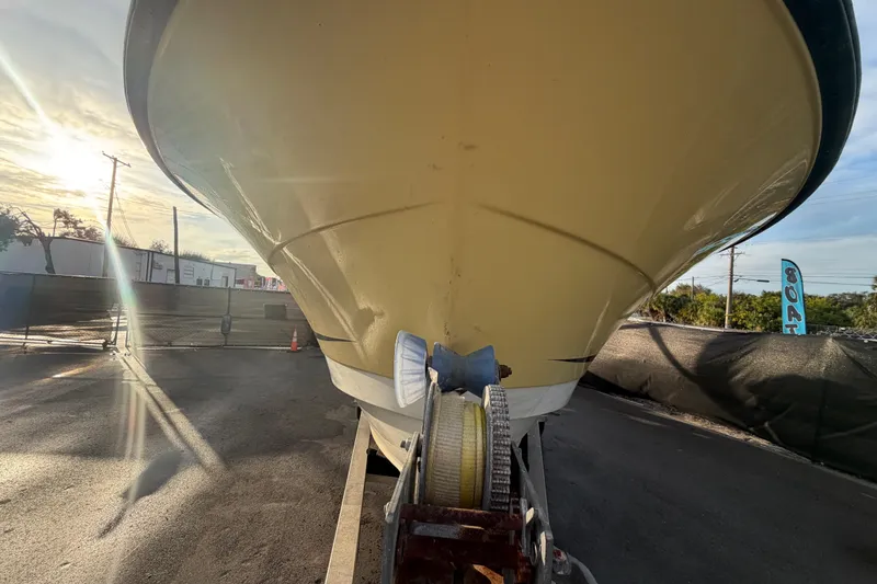 Slide: The Image of 2003 Hydra-Sports Vector 2600 CC boat on trailer, displayed outdoors. - 9