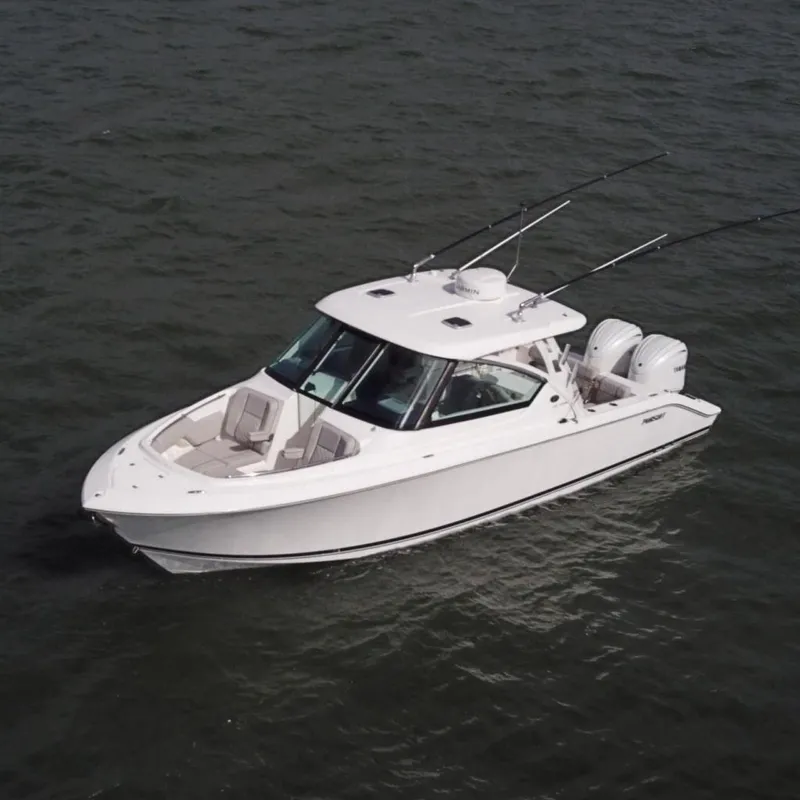 The Image of 2023 Pursuit DC 295 Dual Console on the water. - 0