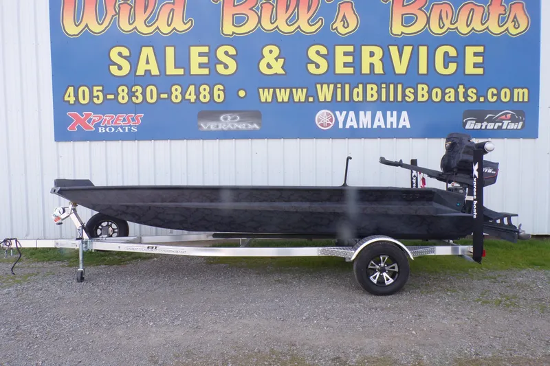 The Image of 2026 Xpress Bayou 180 boat on trailer at Wild Bill's Boats dealership. - 0