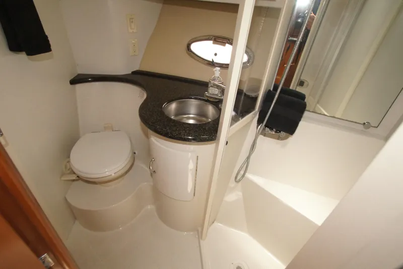 Slide: The Image of Bathroom interior of 2005 Carver 44 Cockpit Motor Yacht with sink and shower. - 12