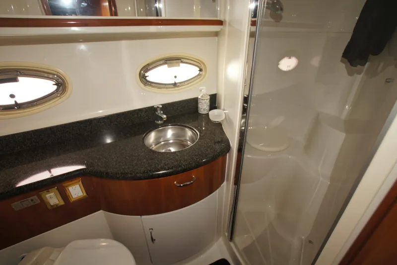 Slide: The Image of Bathroom interior of 2005 Carver 44 Cockpit Motor Yacht with sink and shower. - 14