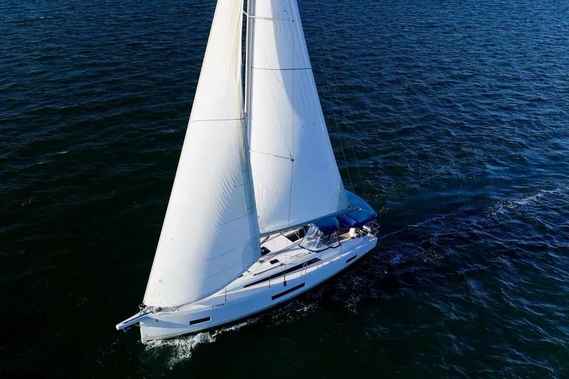 Slide: The Image of 2022 Beneteau Oceanis 40.1 sailing on open water, showcasing elegant design and performance. - 146
