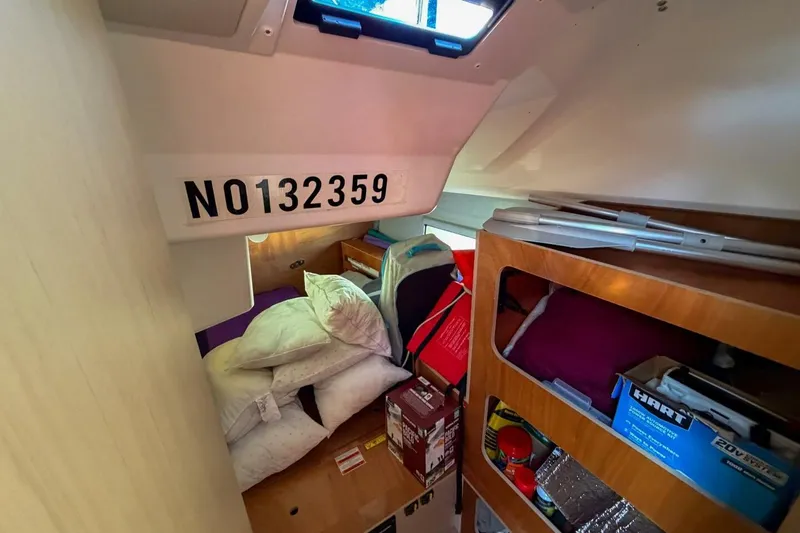 Slide: The Image of Interior cabin of 2022 Beneteau Oceanis 40.1 yacht with storage and bedding. - 24