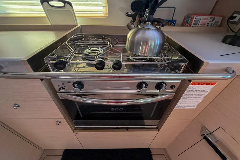 Slide: The Image of Modern kitchen stove in 2022 Beneteau Oceanis 40.1 yacht galley. - 31