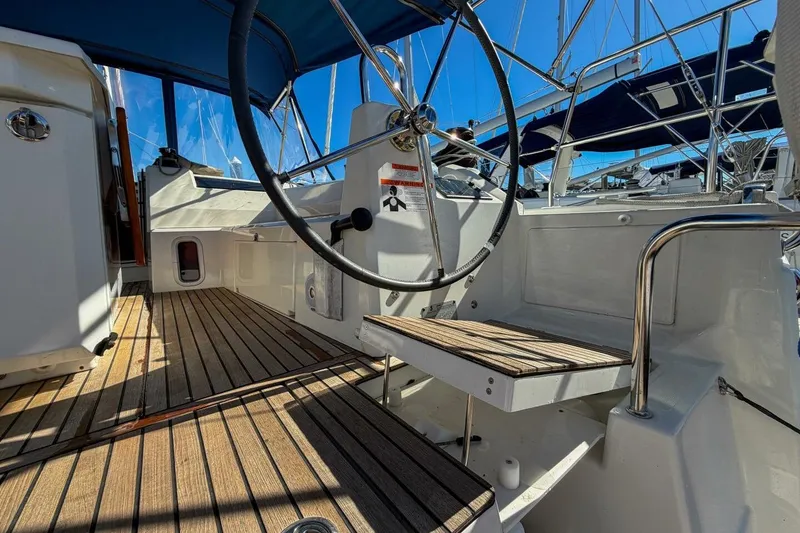 Slide: The Image of Beneteau Oceanis 40.1 cockpit with open storage compartment, 2022 model. - 61